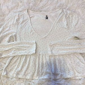 long sleeved white top